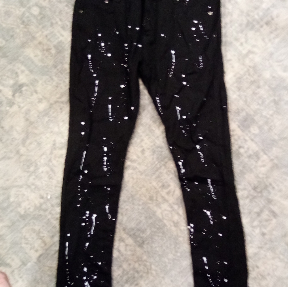 Paint splatter black skinny jeans